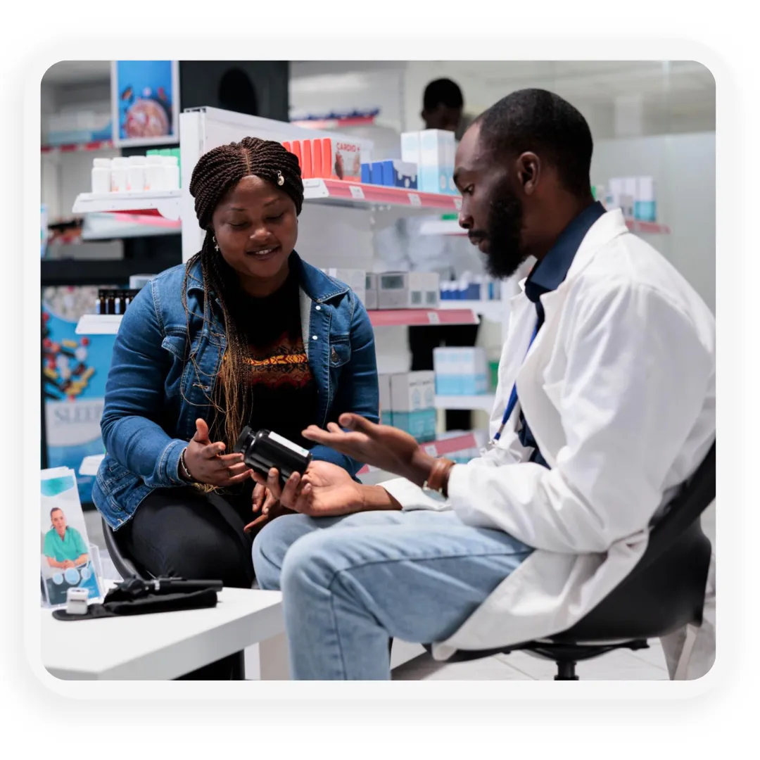Pharmacist discussing medicine option with customer